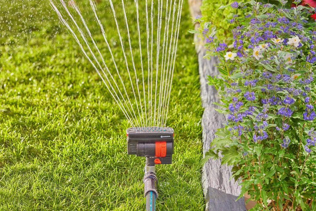 GARDENA 20575 | Up to 2300 sq ft - ZoomMaxx Adjustable Oscillating Sprinkler on Metal Step Spike for Watering Large